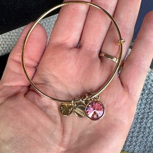 Alex & Ani made in the USA good energy goldtone bracelet with large pink crystal